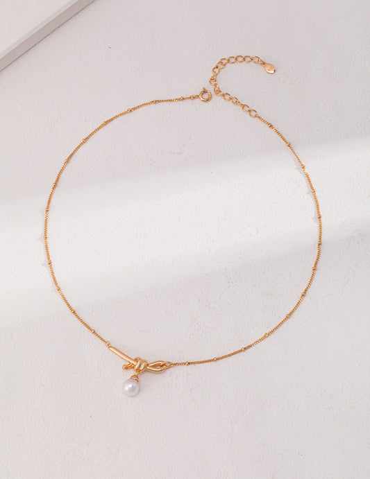 Knotted Pearl Necklace